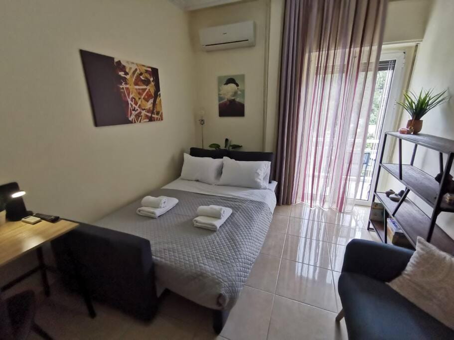 Bed, Living room, towels, air conditioner