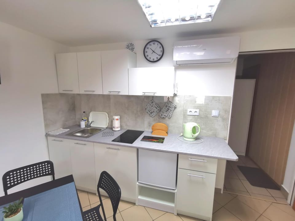 Kitchen or kitchenette, stove