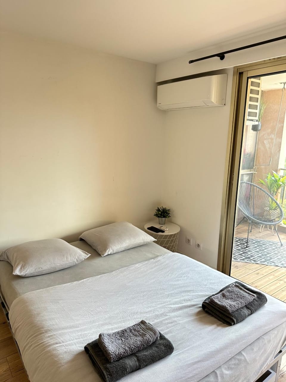 Bed, Photo of the whole room, Bedroom, towels, air conditioner
