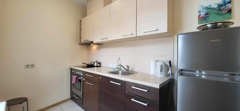 Kitchen or kitchenette, oven, stove