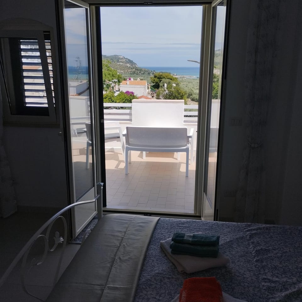 Natural landscape, View (from property/room), Bedroom, Sea view