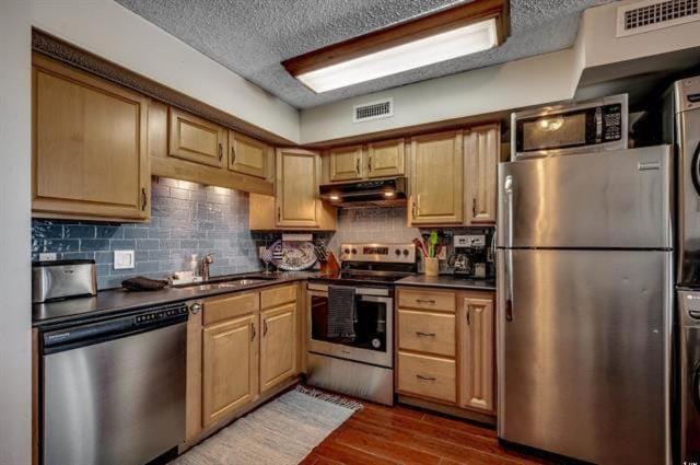 Kitchen or kitchenette, dishwasher, furniture, microwave, oven, kitchen, air conditioner