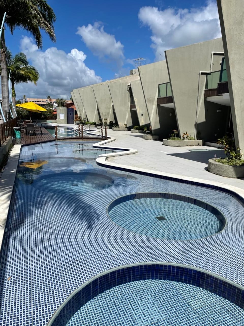 Property building, Day, Pool view, Swimming pool, sunbed