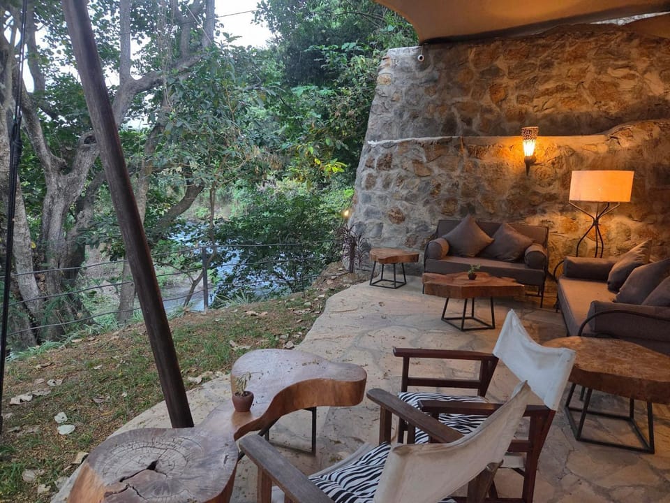Patio, Natural landscape, Living room, Seating area, River view