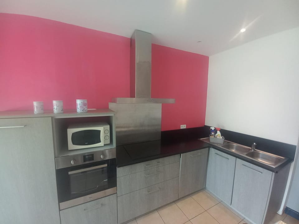 Kitchen or kitchenette, dishwasher, oven, stove, toaster