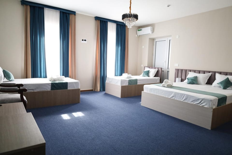 Bed, Photo of the whole room, Bedroom, towels, air conditioner