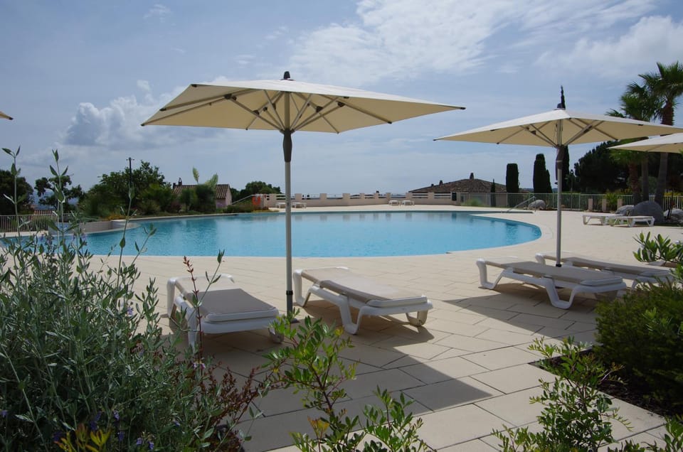 Property building, Living room, Swimming pool