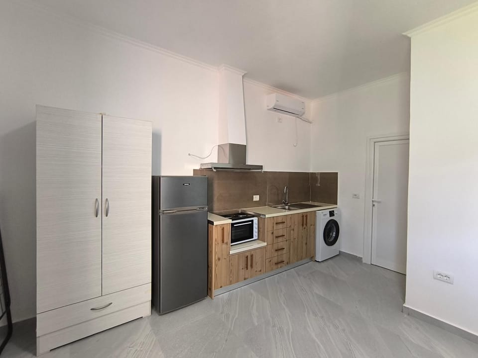 Kitchen or kitchenette, washing machine