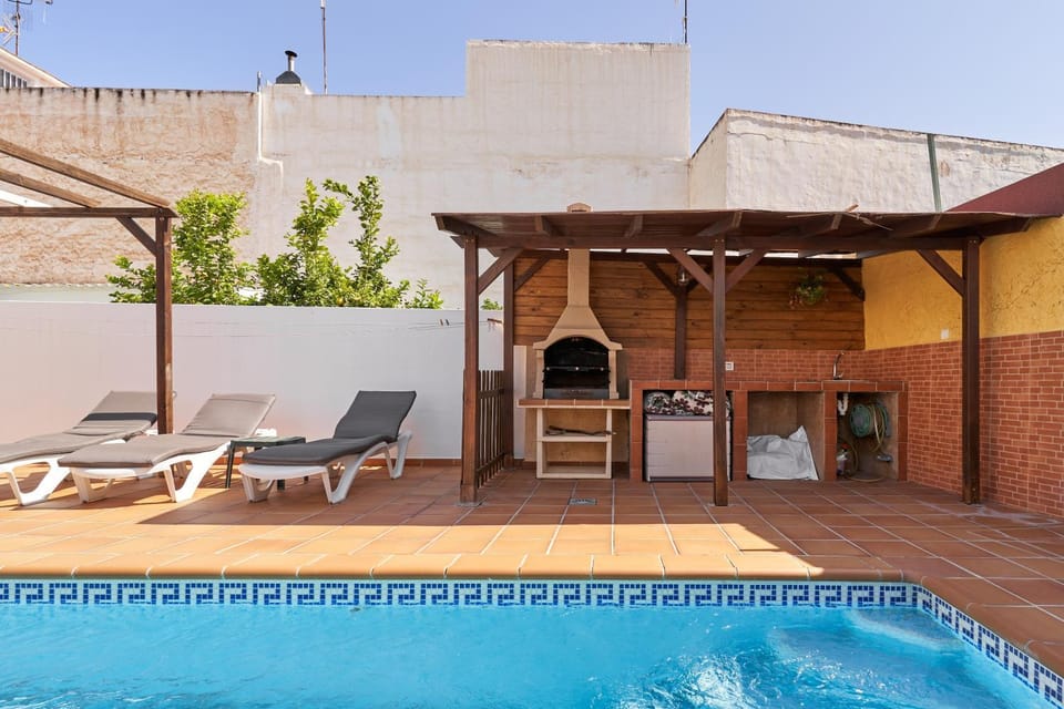 Property building, Living room, Swimming pool
