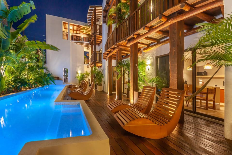 Property building, Patio, Seating area, Pool view, Swimming pool, sunbed