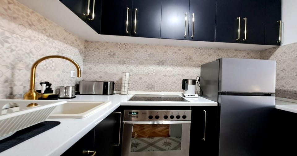 Kitchen or kitchenette, oven, stove, toaster