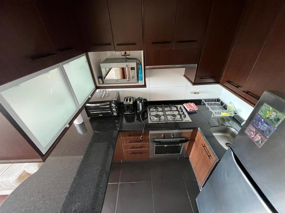 Kitchen or kitchenette, oven, stove