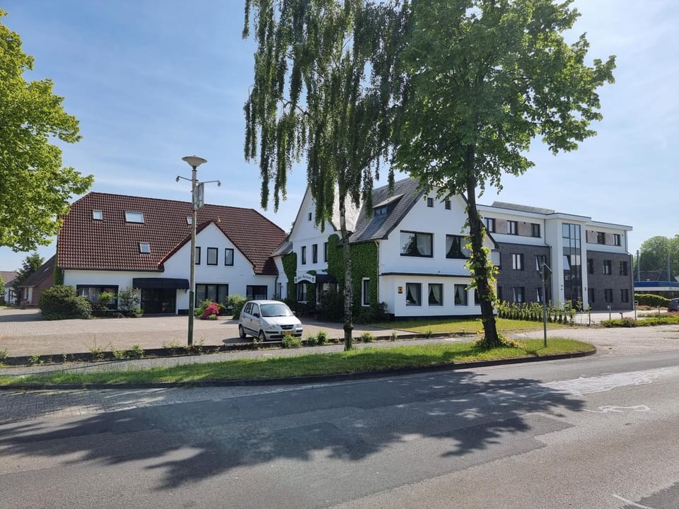 Property building, Day, Street view, Location, Parking