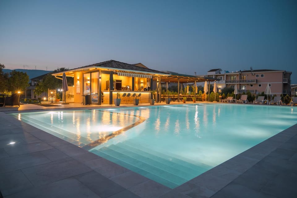 Property building, Night, Pool view, Swimming pool, sunbed