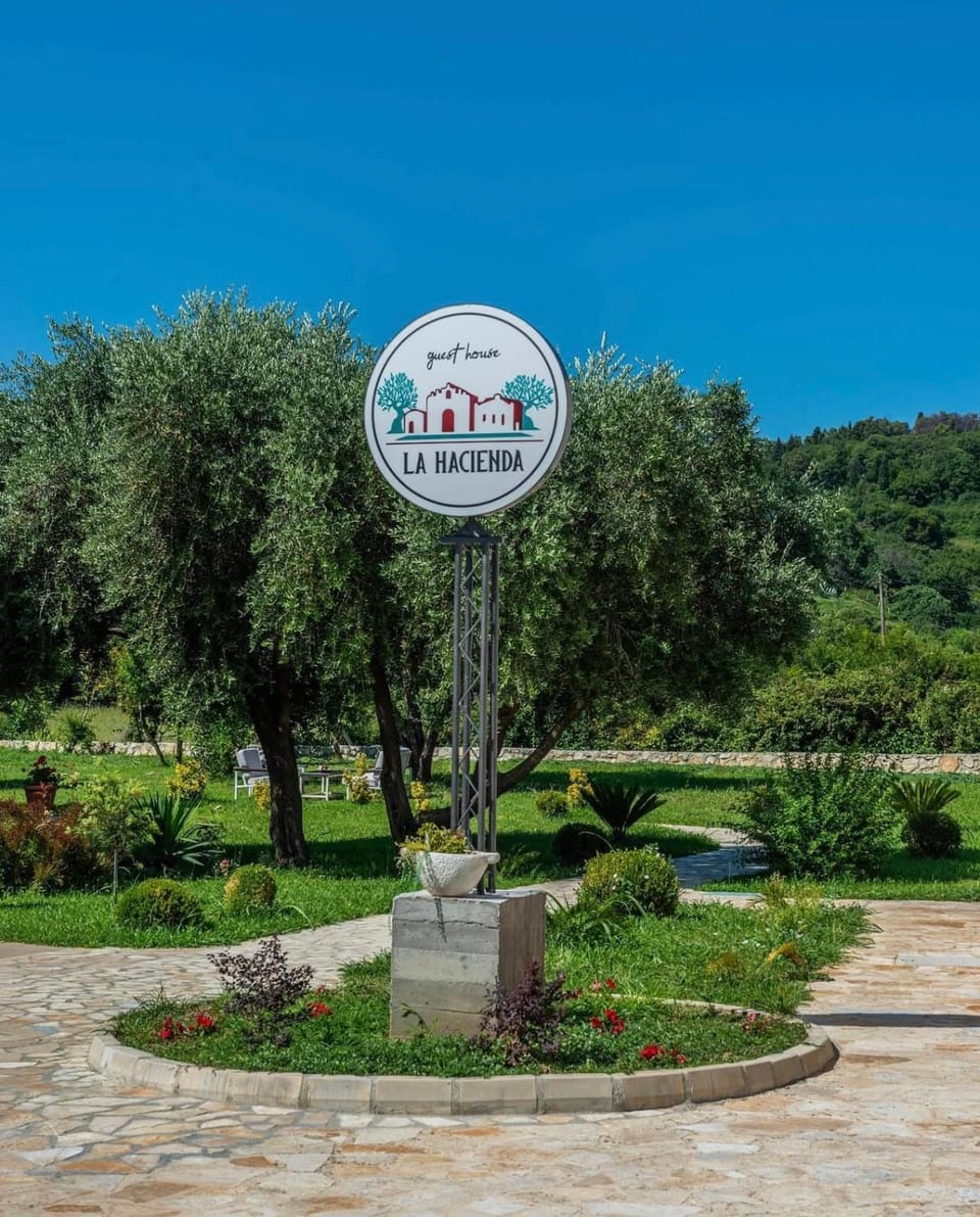 Spring, Day, Property logo or sign, Natural landscape, Garden, Logo/Certificate/Sign, Text overlay, Garden view, Street view, Certificate/Award