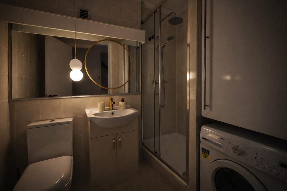 Shower, Toilet, Bathroom, hair dryier, washing machine, dryer
