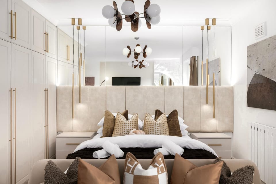 Bed, towels, wardrobe
