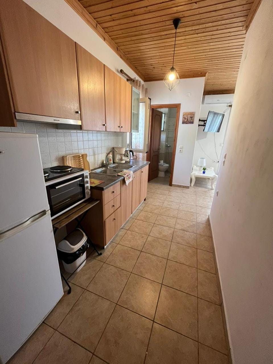 Kitchen or kitchenette, toaster