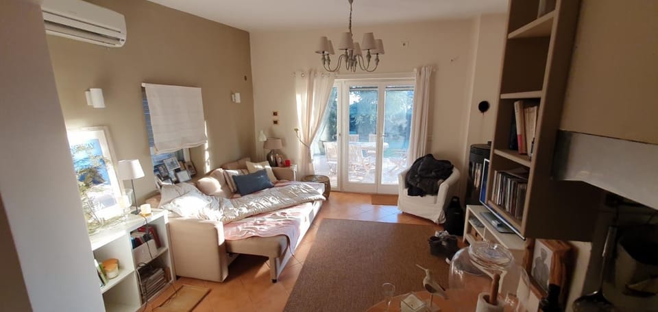 Living room, Seating area, hair dresser, air conditioner