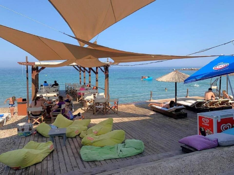 Patio, Nearby landmark, Natural landscape, Snorkeling, Bathroom, Lounge or bar, Seating area, Beach, Sea view, Area and facilities, Swimming pool, Sports, sunbed