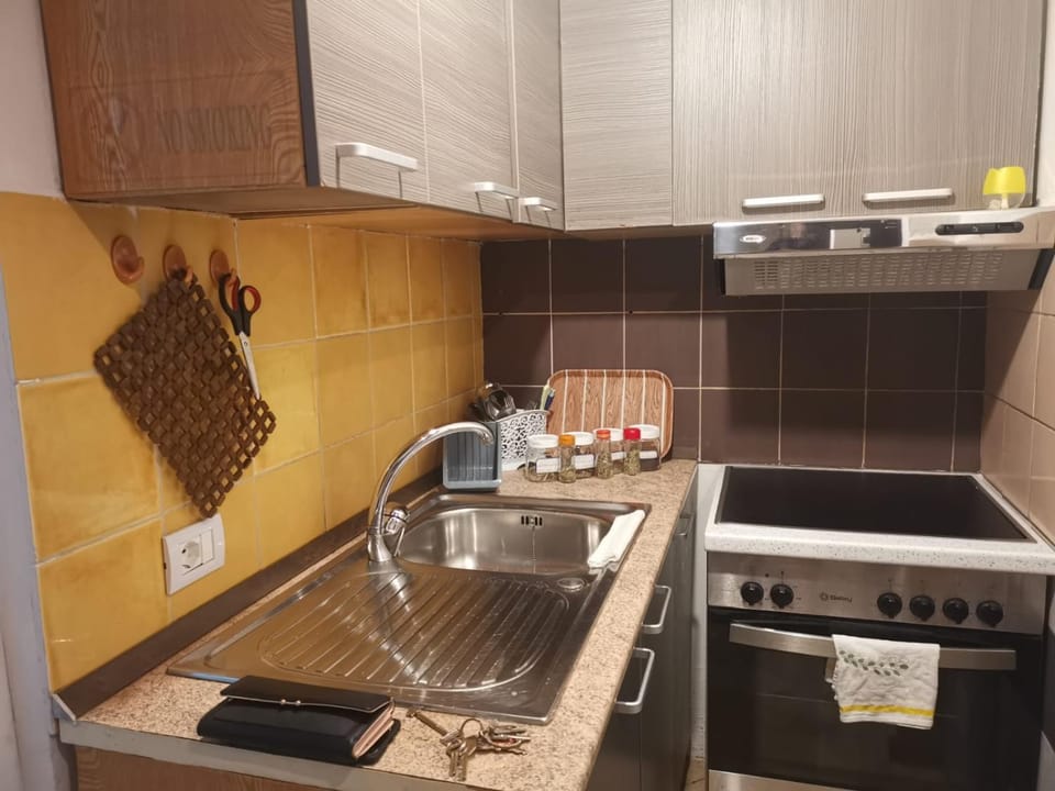 Kitchen or kitchenette, stove