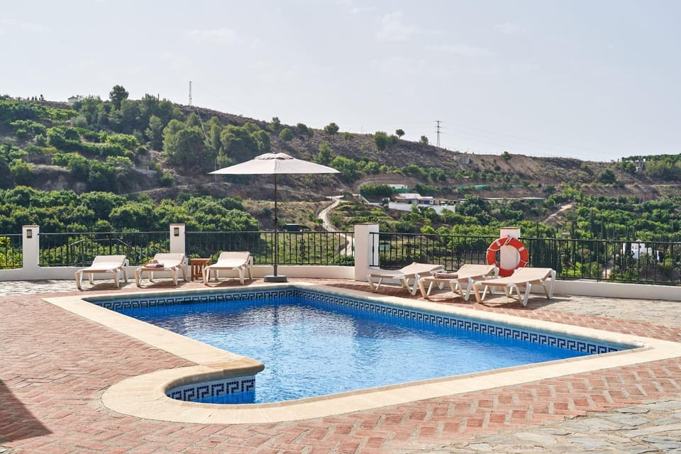 Property building, Living room, Swimming pool