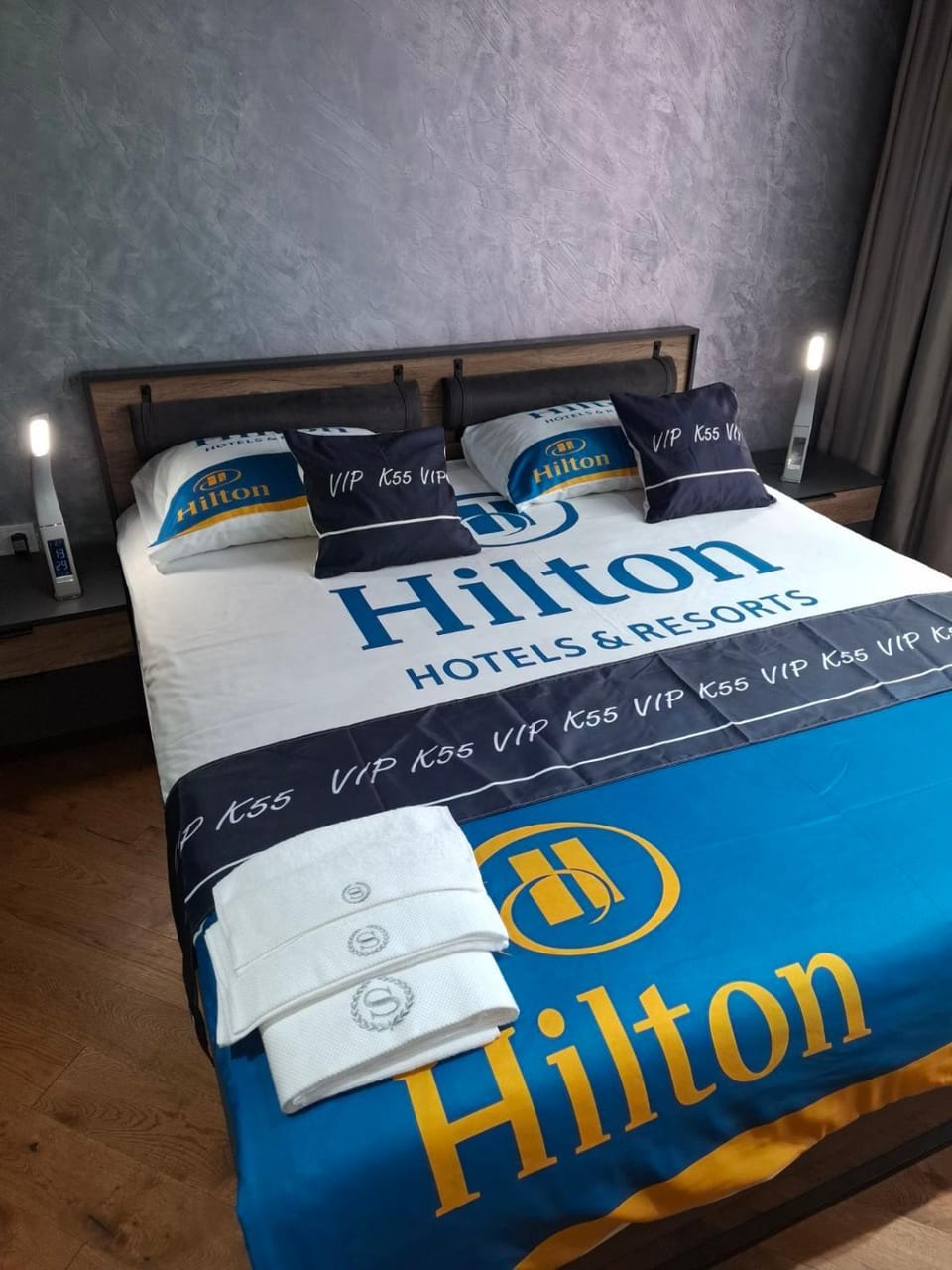 Bed, Property logo or sign, Photo of the whole room, Logo/Certificate/Sign, Bedroom, Text overlay, Certificate/Award