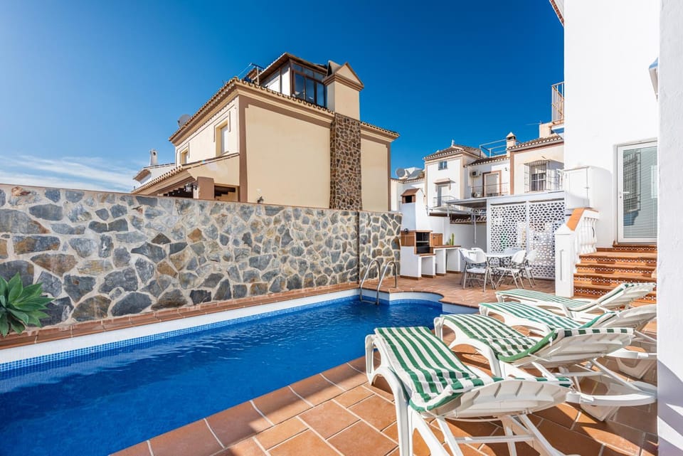 Property building, Living room, Swimming pool