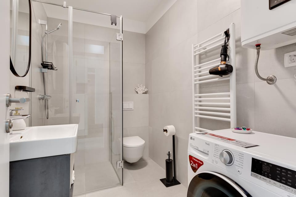 Shower, Toilet, Bathroom, heating, towels, washing machine, dryer
