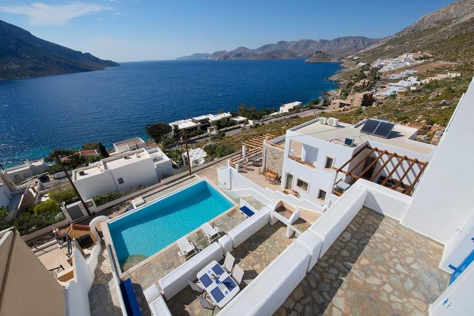 Property building, Patio, Nearby landmark, Natural landscape, Bird's eye view, Balcony/Terrace, Mountain view, Pool view, Sea view, Swimming pool, sunbed