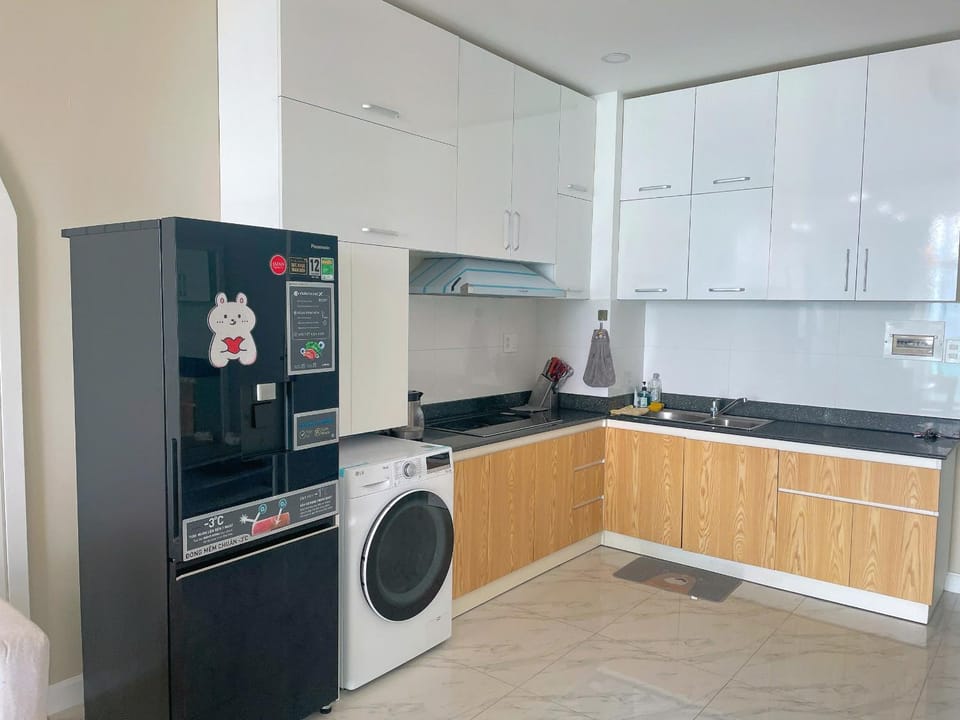 Kitchen or kitchenette, stove, washing machine