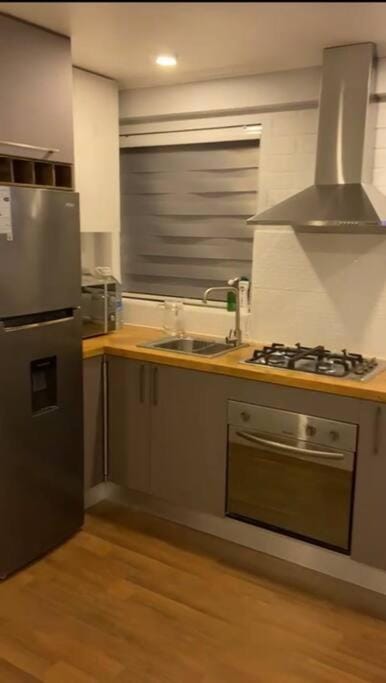 Kitchen or kitchenette, oven, stove