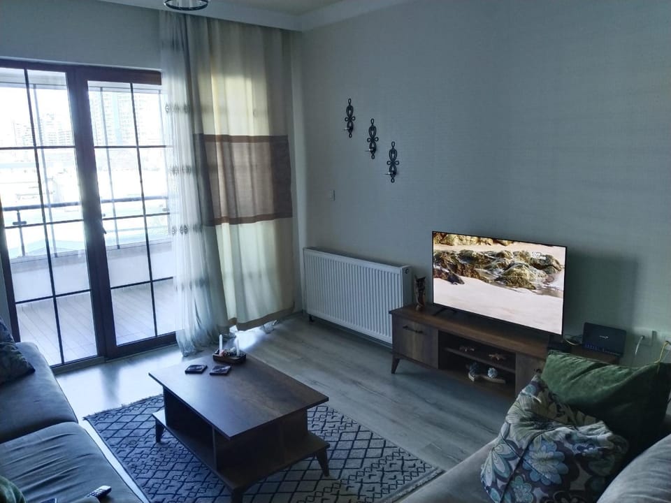 Communal lounge/ TV room, TV and multimedia, Living room, Seating area, Evening entertainment