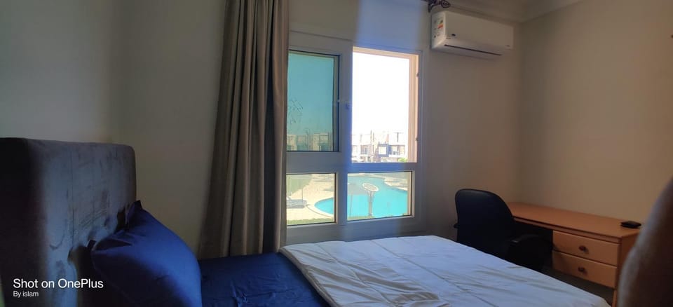 Bed, Bedroom, Pool view, Swimming pool, air conditioner