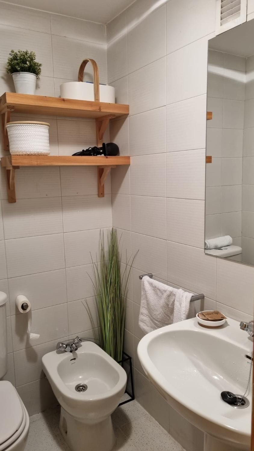 Bathroom, bidet, towels
