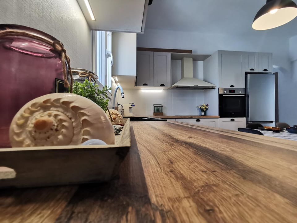 Kitchen or kitchenette, dishwasher, oven, stove