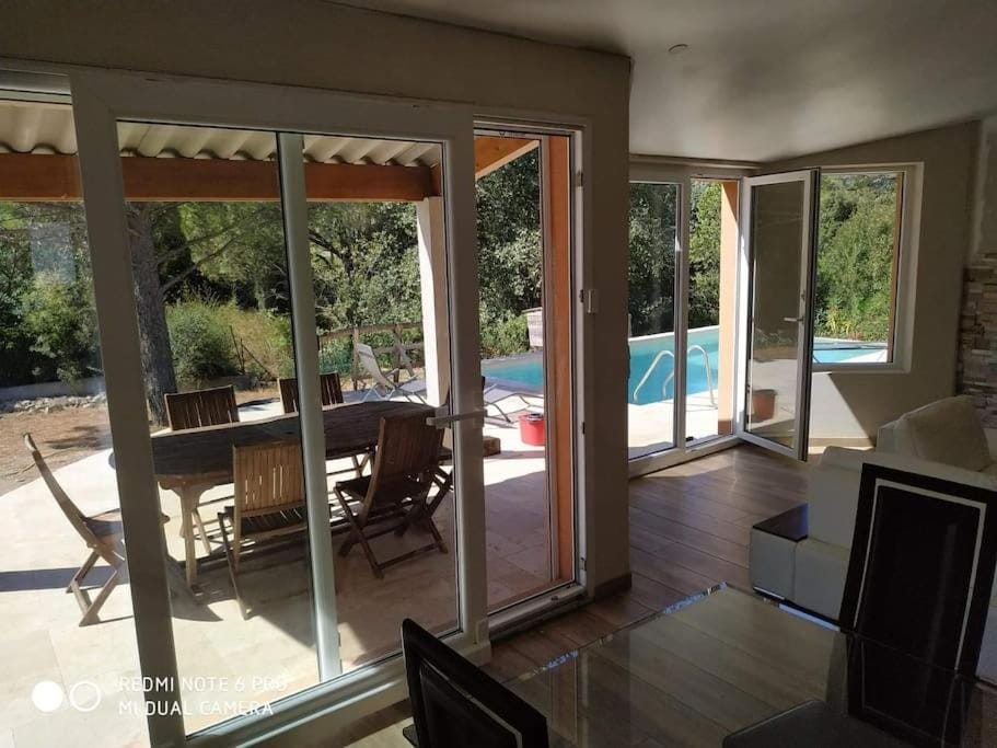 Patio, Living room, Seating area, Dining area, Pool view, Swimming pool