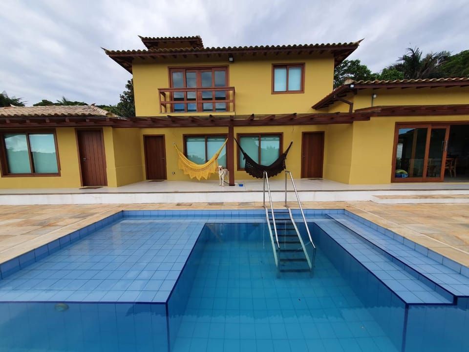 Property building, Day, Pool view, Swimming pool, sunbed