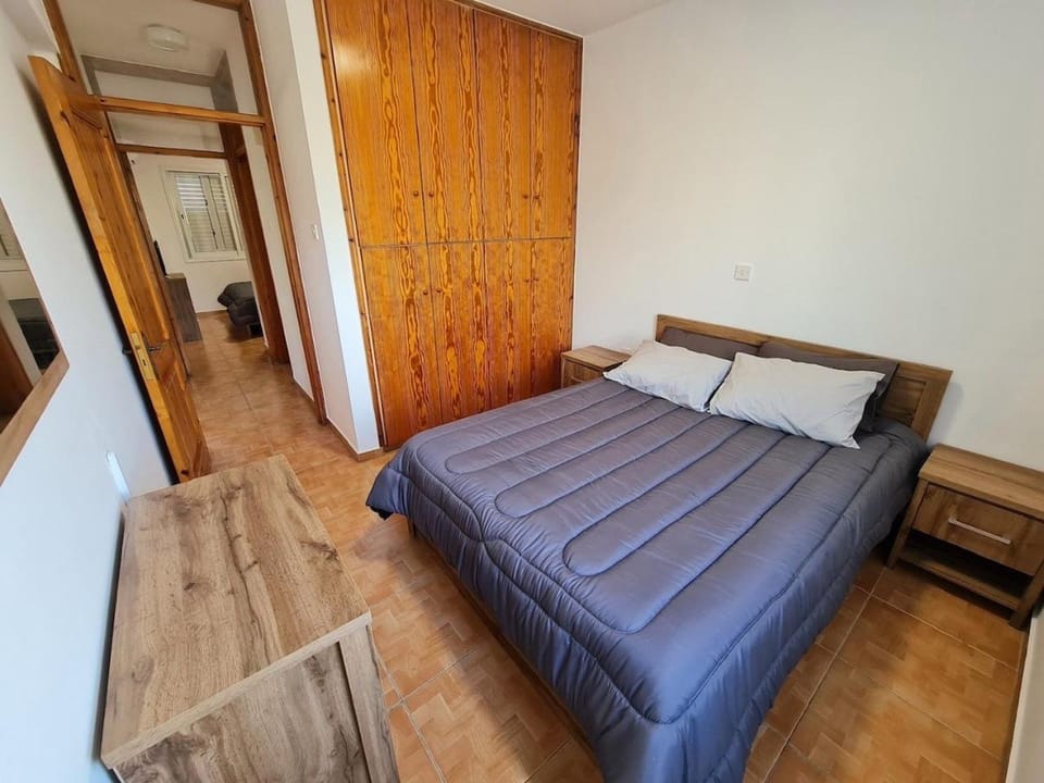 Bed, wardrobe