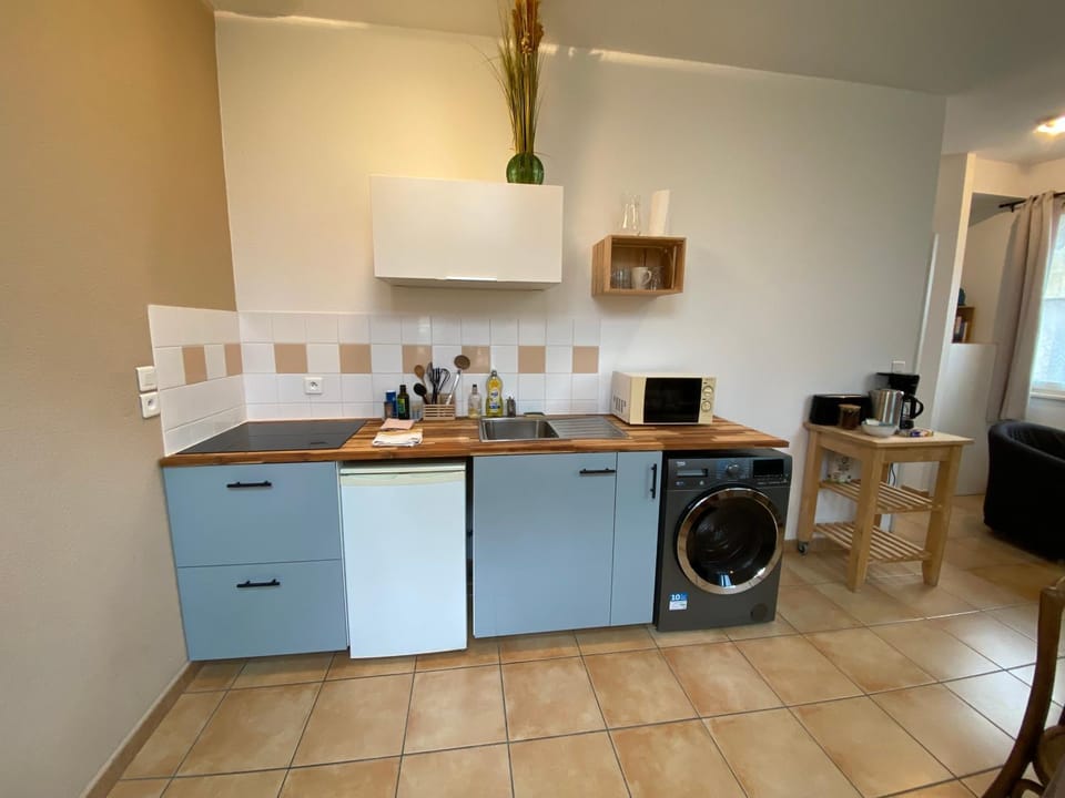 Kitchen or kitchenette, stove, toaster