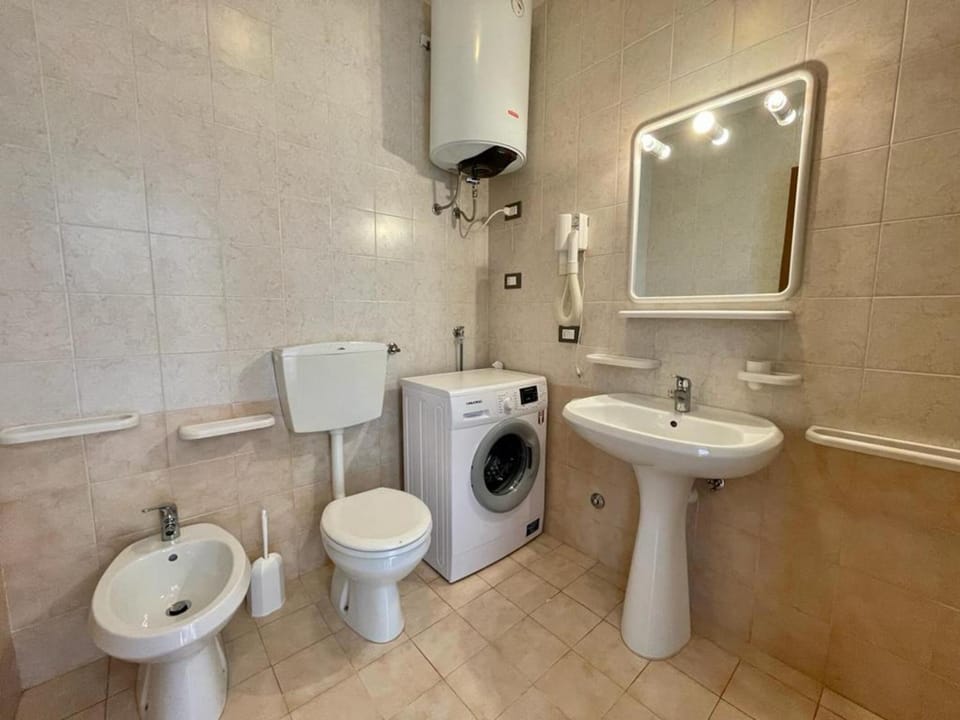 Bathroom, bidet, washing machine