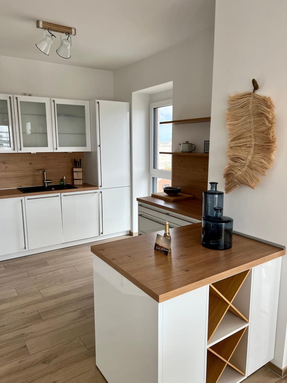 Kitchen or kitchenette, dishwasher, oven, stove