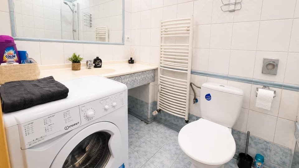 Shower, Toilet, Bathroom, towels, washing machine, dryer