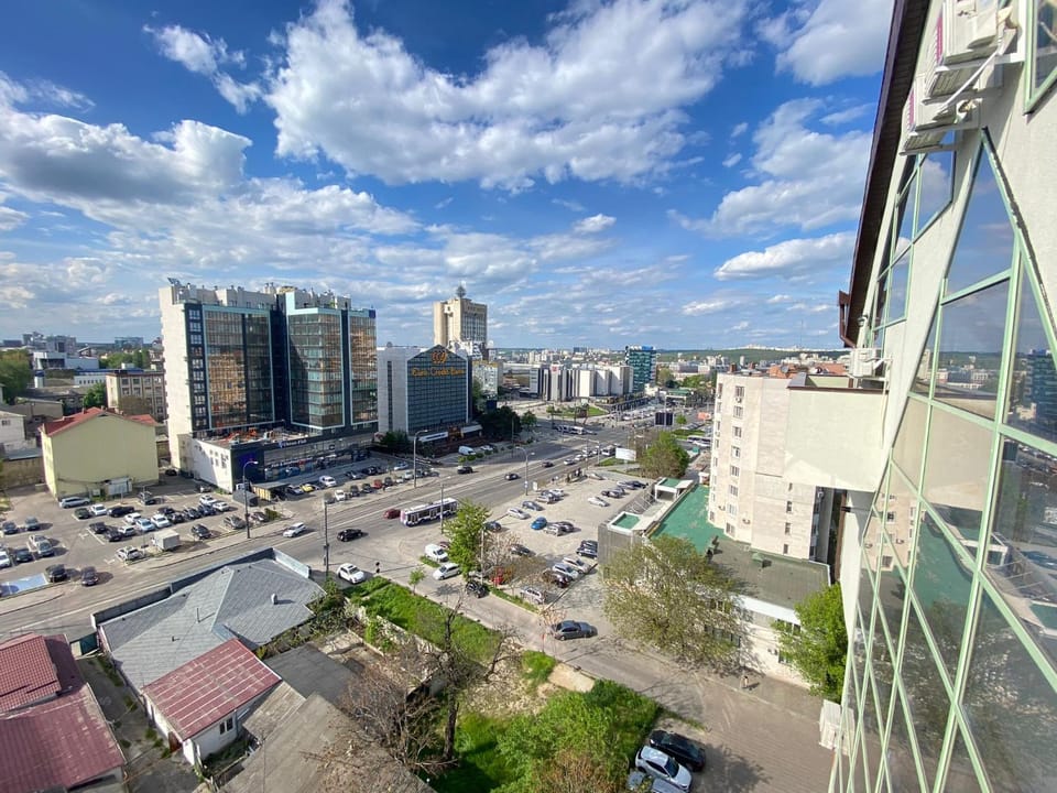 Property building, Day, Bird's eye view, City view, Street view, Location, Parking