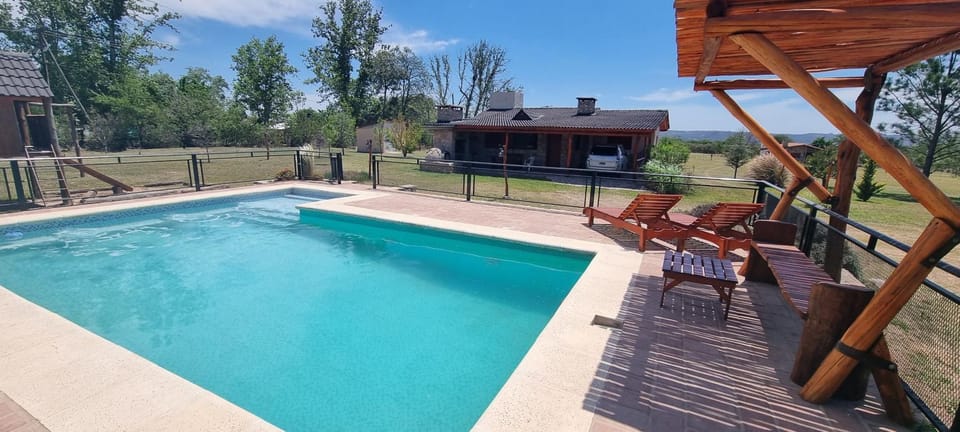 Property building, Patio, Spring, Natural landscape, Garden, Garden view, Pool view, Swimming pool, sunbed
