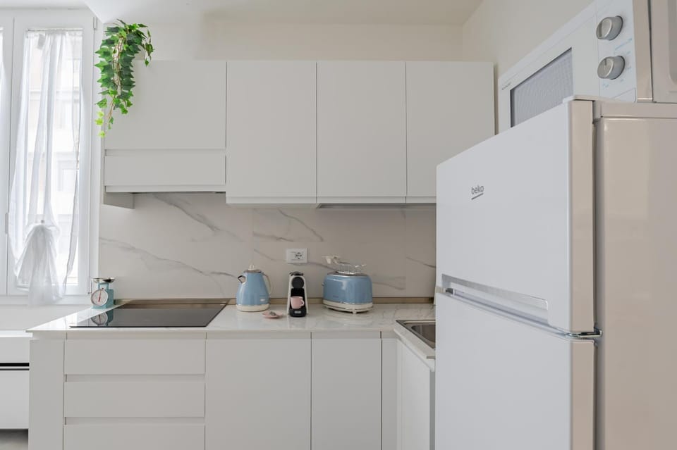 Kitchen or kitchenette, microwave, toaster