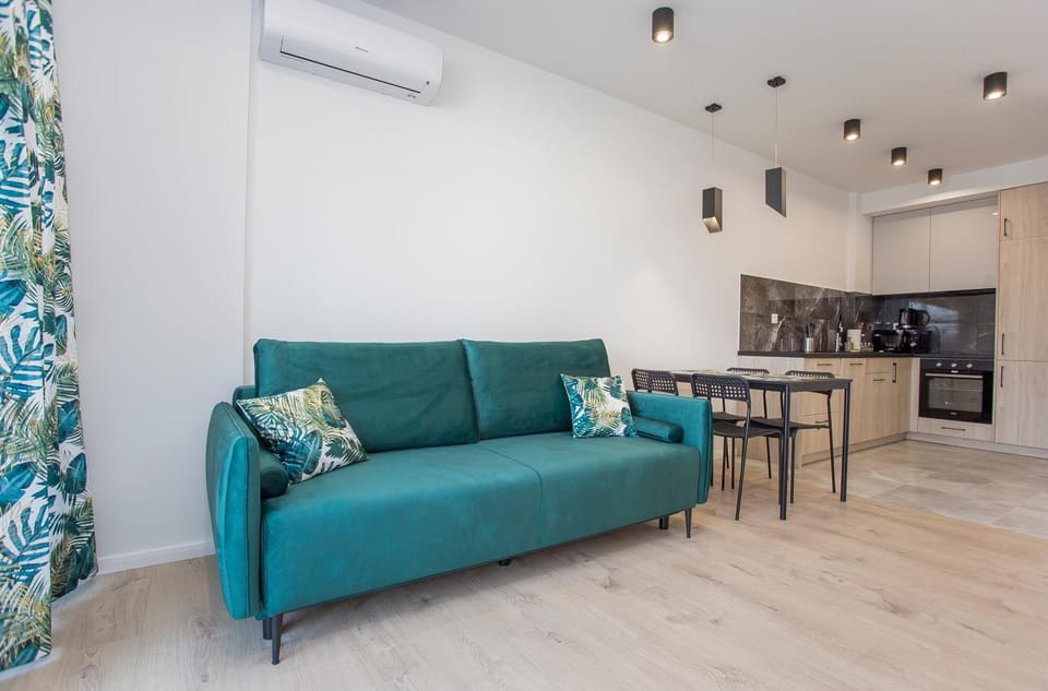 Kitchen or kitchenette, Living room, Seating area, Dining area, air conditioner