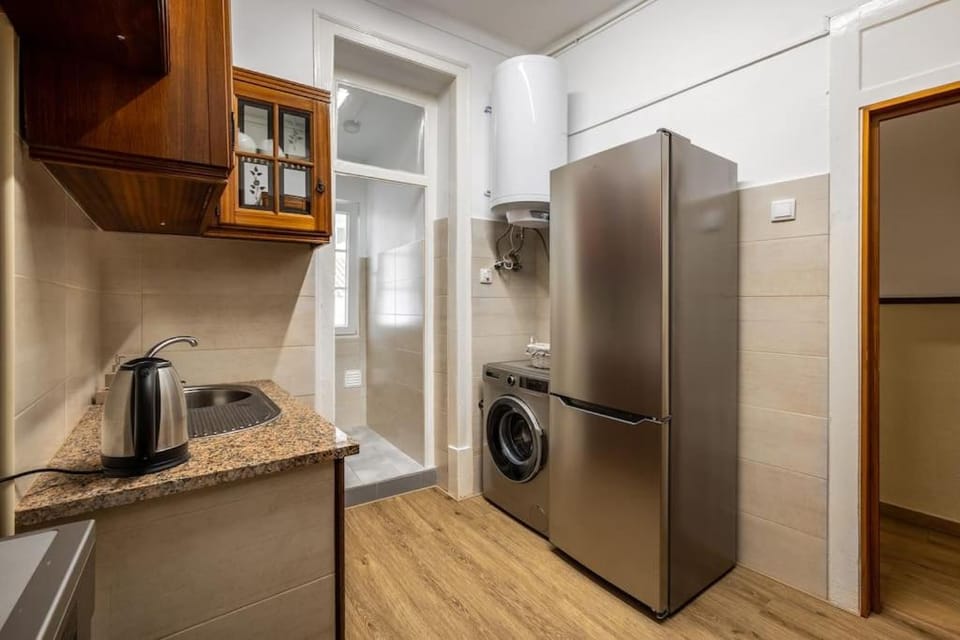 Kitchen or kitchenette, washing machine