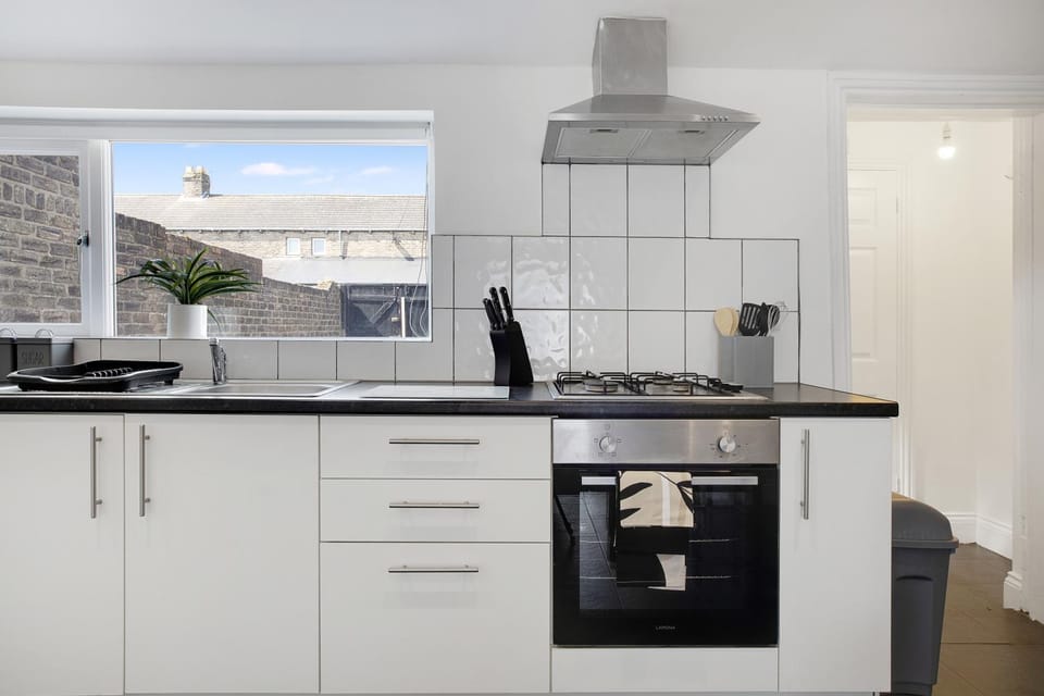 Kitchen or kitchenette, stove