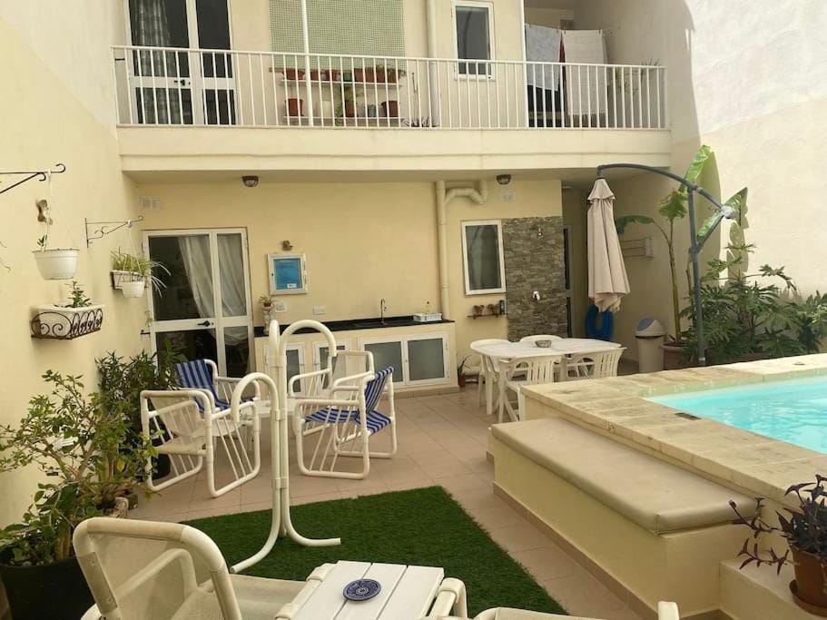 Patio, Seating area, Pool view, sunbed